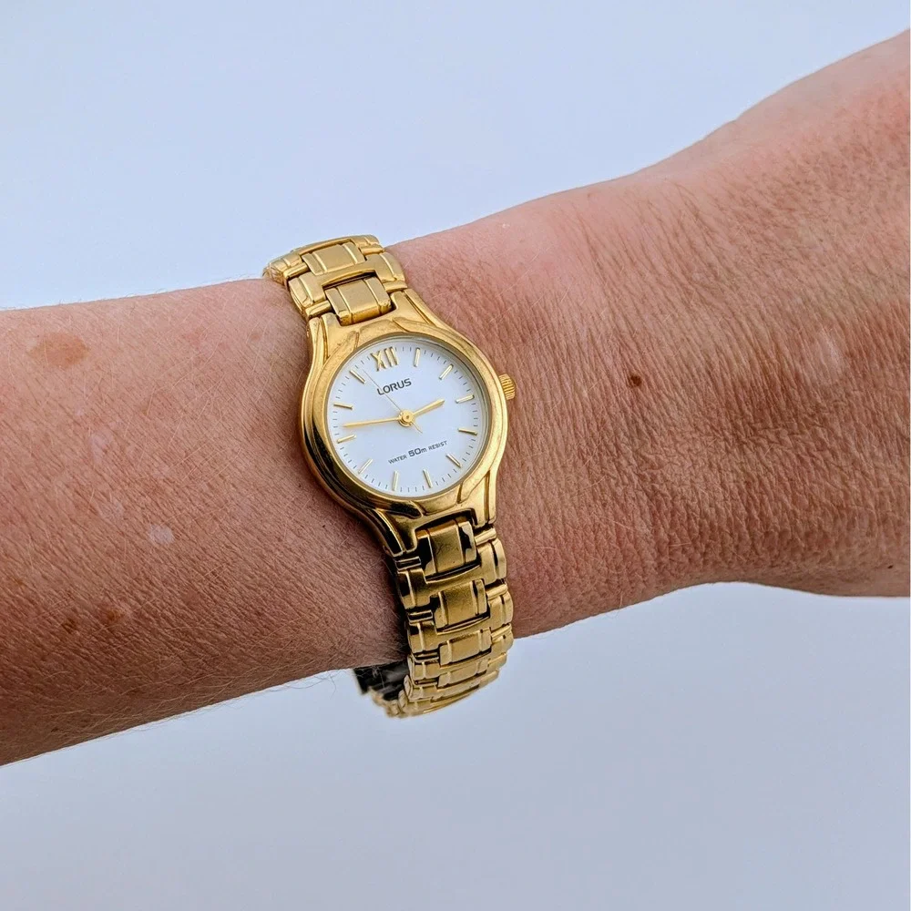 Lorus V501-X263 Women's Gold Tone White Dial Roman Numeral Quartz Watch 24mm 7